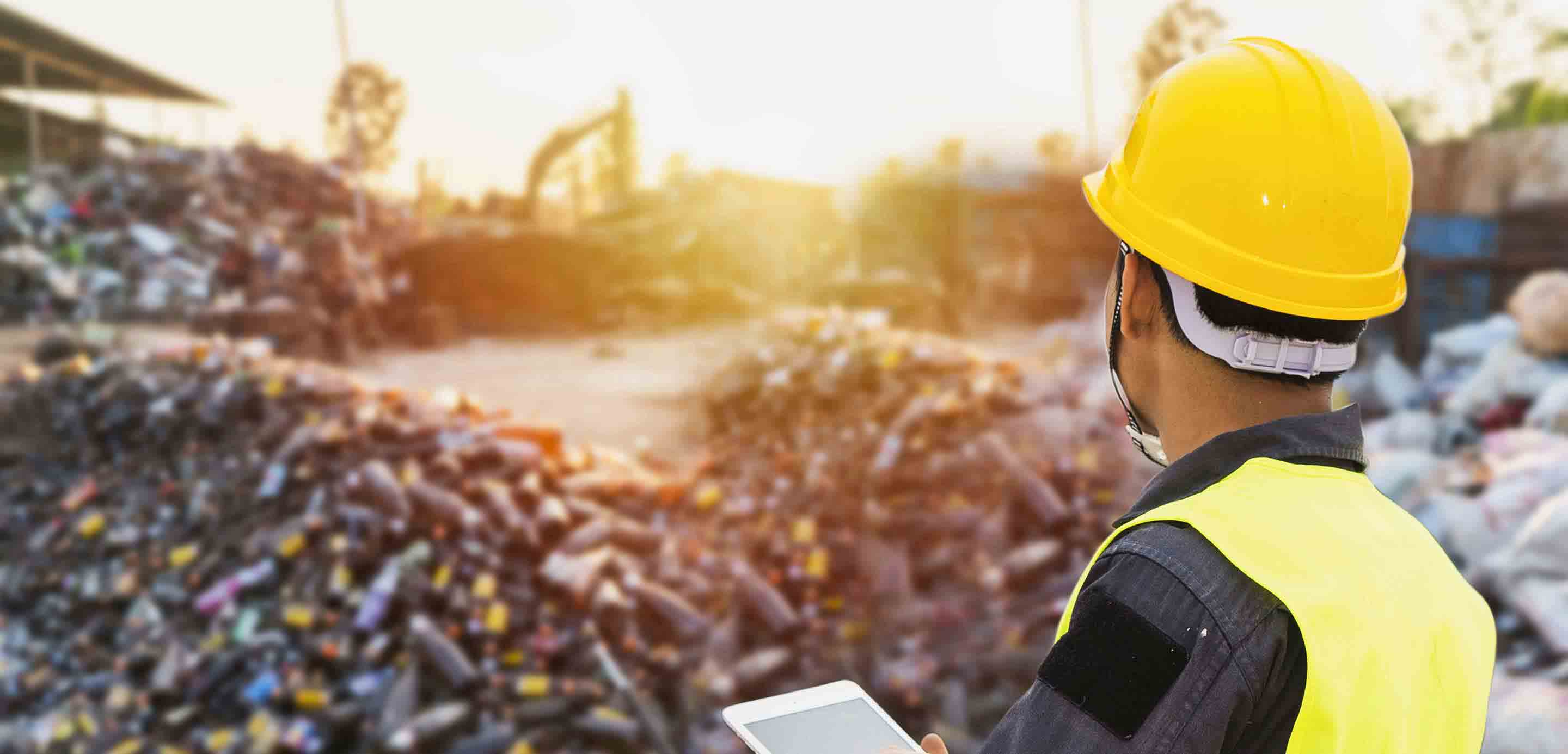 a man oversees waste management for sustainable development a man oversees waste management for sustainable development