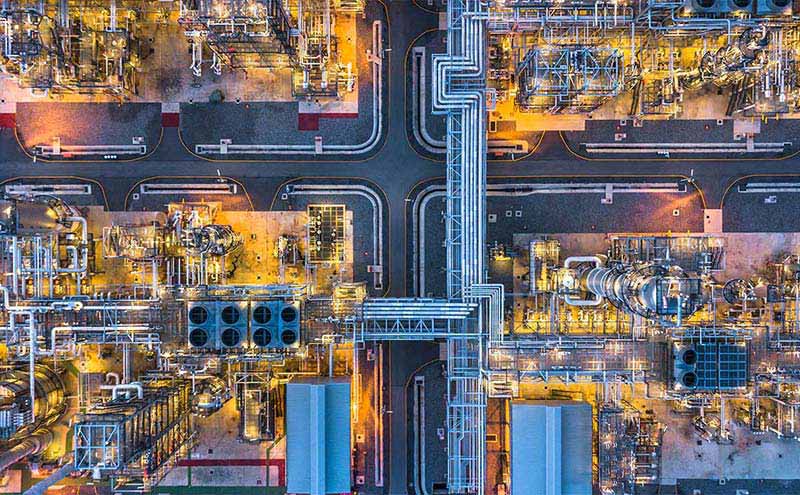 aerial view of electric power plant at night  aerial view of electric power plant at night