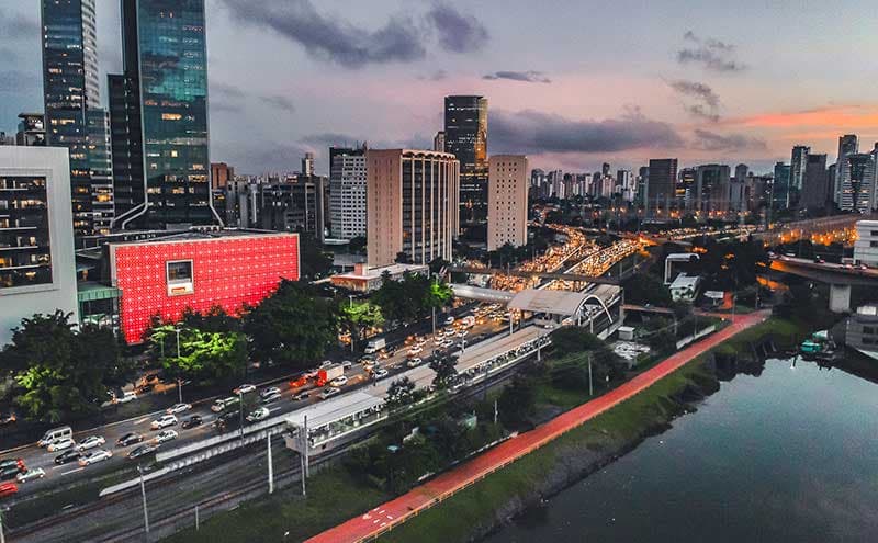 skycrapers and buildings with busy roads in urban cities skycrapers and buildings with busy roads in urban cities